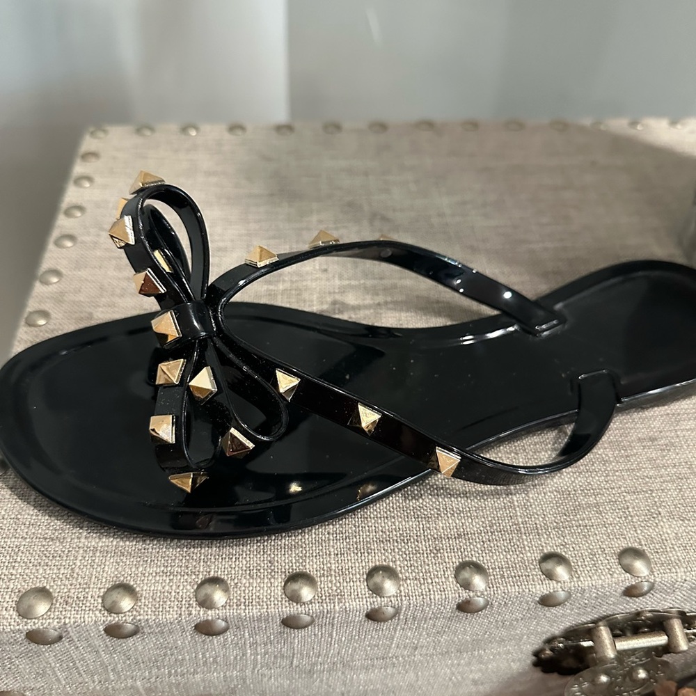Stylish Black Sandals with Gold Accents